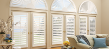 Shutters on Arch Windows in the Living Room
